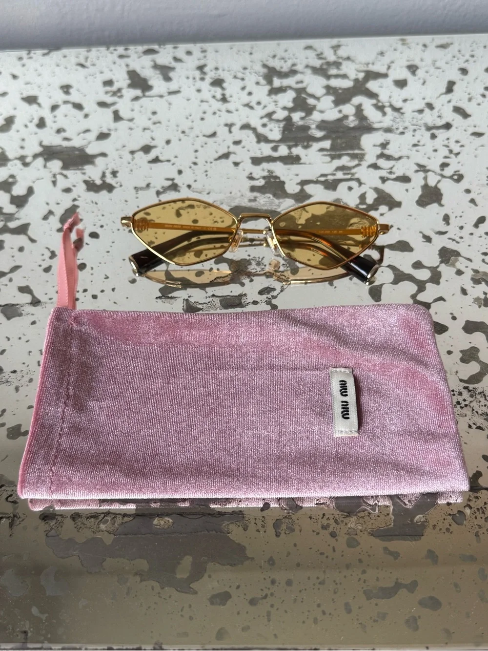 Miu Miu Sunglasses with Yellow Lenses